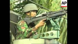 Firefight between Indonesian army and rebels [upl. by Aneehs]