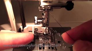 How to use the Automatic Needle Threader on a Sewing Machine [upl. by Meras]