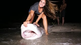 Girlfriend Catches Giant Tiger Shark From Beach [upl. by Diane]