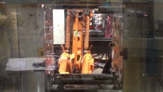 ABB robot part transfer for injection molding press overmold [upl. by Anoiek]