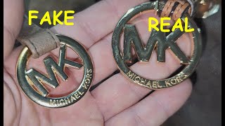 Real vs fake Michael Kors plate logo How to spot fake Michael Kors logos in hand bags [upl. by Adanama]