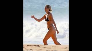 Pregnant Candice Swanepoel flaunts her growing baby bump in tiny thong bikini [upl. by Alyak]