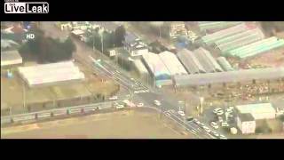 Aerial view of tsunami striking Sendai Japan [upl. by Polik]