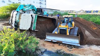 Incredible Overloaded Dump Truck Failed to Drive Up Hill Help By KOBELCO SK210LC Excavator amp Truck [upl. by Lotsyrk]