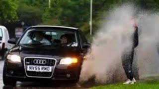 Woman Splashed By Giant Puddle During UK Torrential Rain Downpour [upl. by Gall]