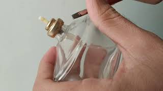 How to Removeopen perfume bottle captop using minus screw driver [upl. by Nrobyalc]