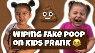 WIPING FAKE POOP ON KIDS PRANK 💩 [upl. by Jacobo]