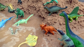 Fun Dinosaurs and Sea Animal Toys in the Sandbox [upl. by Aicilav572]