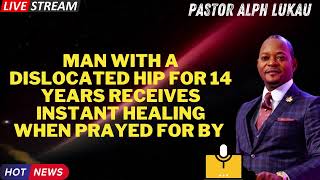 Man with a Dislocated Hip for 14 Years receives instant healing when prayed for by Pastor Alph Lukau [upl. by Ennairam]