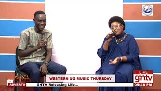 Ketty Mukiza explains how she composed Ahoori and Ekibiikire Tikijuunda [upl. by Bevon]