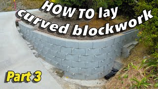 How to RETAINING WALL  pt3  lay block work amp french drain [upl. by Ailekahs384]