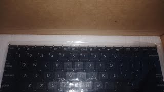 Asus E203nah Keyboard replacement [upl. by Aizahs]