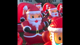 Dufferin Ave  Inflatable Santas Everywhere [upl. by Aitnahs]