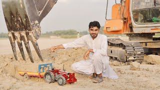 Massey 385 4x4 pulling over loading trolley  trolley loading with Excavator  Muhammad khan [upl. by Arral533]