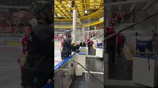 Hockey player is choosing his stick during the warm up [upl. by Tterag]