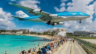 BOEING 747 low LANDING above THE BEACH  St Maarten and Maho Beach 4K [upl. by Sweyn783]