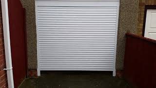 White Garage Roller Door 55mm slats under lintel fitting [upl. by Hollerman658]