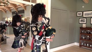 Lonach Pipe Band March through the new Braemar Highland Games Centre amp Pavilion in Scotland [upl. by Omrellug]