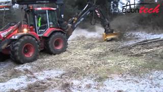 Backhoe loader mounted mulcher  HUDDIG mit Seppi Forstmulcher [upl. by Ahsii673]