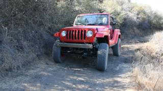 Jeep JK quotShort Cutquot concept vehicle tackling moguls [upl. by Jolee36]