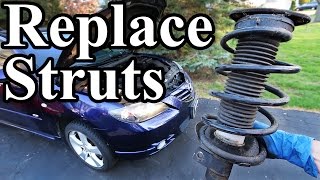 How to Replace Struts in your Car or Truck [upl. by Enilada]