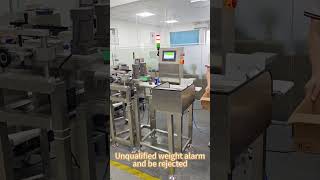 High speed checkweigher and high accuracy for cans products with gripper [upl. by Alenson]