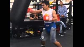 Manny Pacquiao hitting the heavy bag in preparation for Mayweather fight [upl. by Yunick]