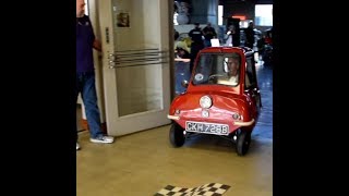 Peel P50 microcar drives out front door [upl. by Eglanteen502]