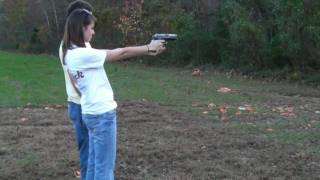 Girl shooting a 45 pistol then waving it around [upl. by Eva635]