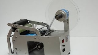 semi automatic round bottle labeling machine sticker labeling halbautomatische Etikettiermaschine [upl. by Enidaj164]