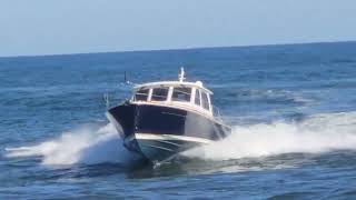 Saber  On Holiday Riding The Manasquan Inlet Wakes  Point Pleasant Beach New Jersey [upl. by Bithia903]