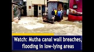 Watch Mutha canal wall breaches flooding in lowlying areas  Maharashtra News [upl. by Elockin812]