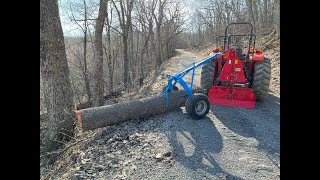 Harvesting cherry logs with a Logrite Fetching Arch amp a Wallenstein FX110 winch with a Kubota M6060 [upl. by Weiner861]