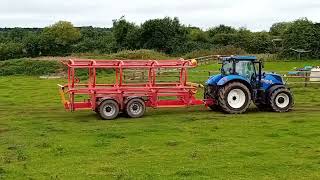 20 Bales in 1 minute  New Holland T7210 amp Keltec Bale Carriers [upl. by Ethan294]