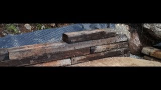 Railroad sleeper Retaining Wall  just a small wall DIY [upl. by Lassiter184]