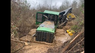 Stuck Skidder in the Swamp Creek Deere Logging Accident Disaster Trackhoe Excavator Rescue [upl. by Ydarb]