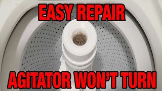 How to Repair Agitator Dogs On A Whirlpool Washing Machine [upl. by Enitnemelc]