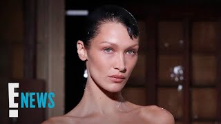 Bella Hadid Has Dress SPRAYPAINTED ON During Runway Show  E News [upl. by Kreegar]