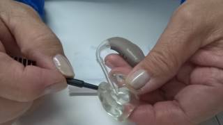 How to Clean a BTE Behindtheear Hearing Aid [upl. by Aihsrop741]