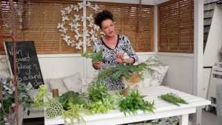 Flowers amp Floristry Tutorial Warm Based Foliage into a Round Classic Urn [upl. by Rodi188]