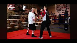 Create openings by using feints with your rear hand to set up punches with your lead hand boxing [upl. by Suzann]