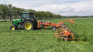 Tedding silage with JD amp Kuhn [upl. by Blakely]