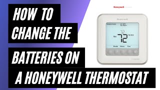 How To Change the Batteries on a Honeywell Thermostat [upl. by Ellerol]