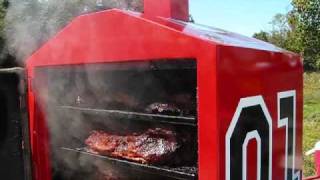 BBQ Smoker loaded with 18 full sized beef briskets Cooking with Wine and the BBQ Vault [upl. by Deming]