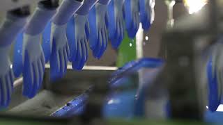 Dipping process of nitrile gloves in the manufacturing process [upl. by Rivard]