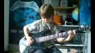 Eight year old plays metallica  one [upl. by Neimad]