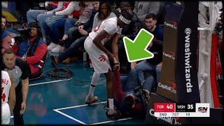 Chris Boucher helps up a struggling cameraman  RAPTORS vs WIZARDS [upl. by Anilet]