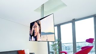 Support TV au plafond en portefeuille avec descente et pivotant  Flip 900 [upl. by Yerrok]