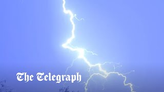 UK weather Dramatic thunderstorms light up night sky above London as flood warnings issued [upl. by Udella586]