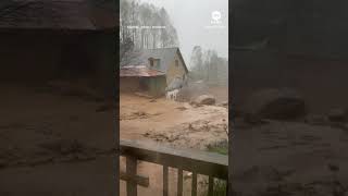 Mudslide triggered by Helene sweeps through North Carolina yard [upl. by Bove]